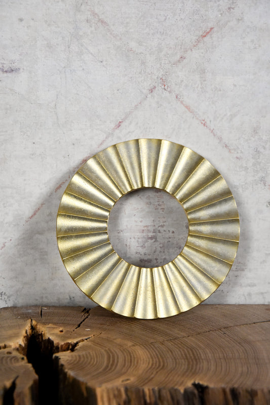 Trivet (sun)