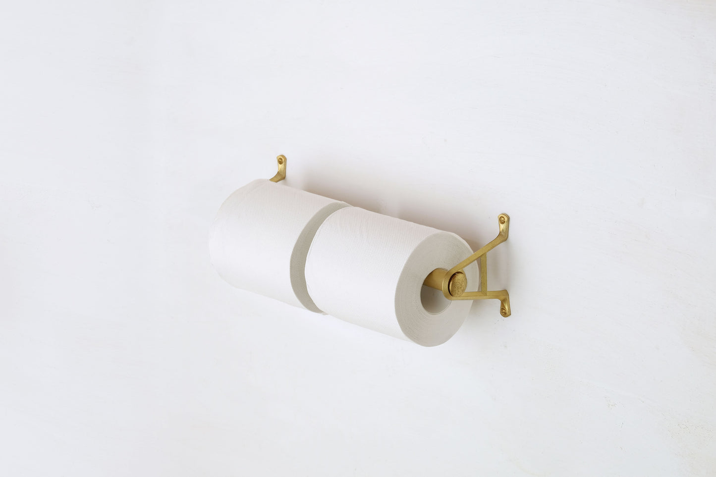 Pipe bracket for toilet paper