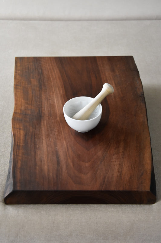 Mortar with wooden pestle